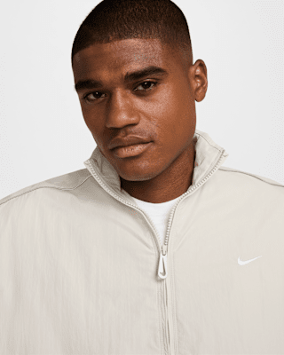 Nike Sportswear Solo Swoosh Men's Woven Track Jacket. Nike.com